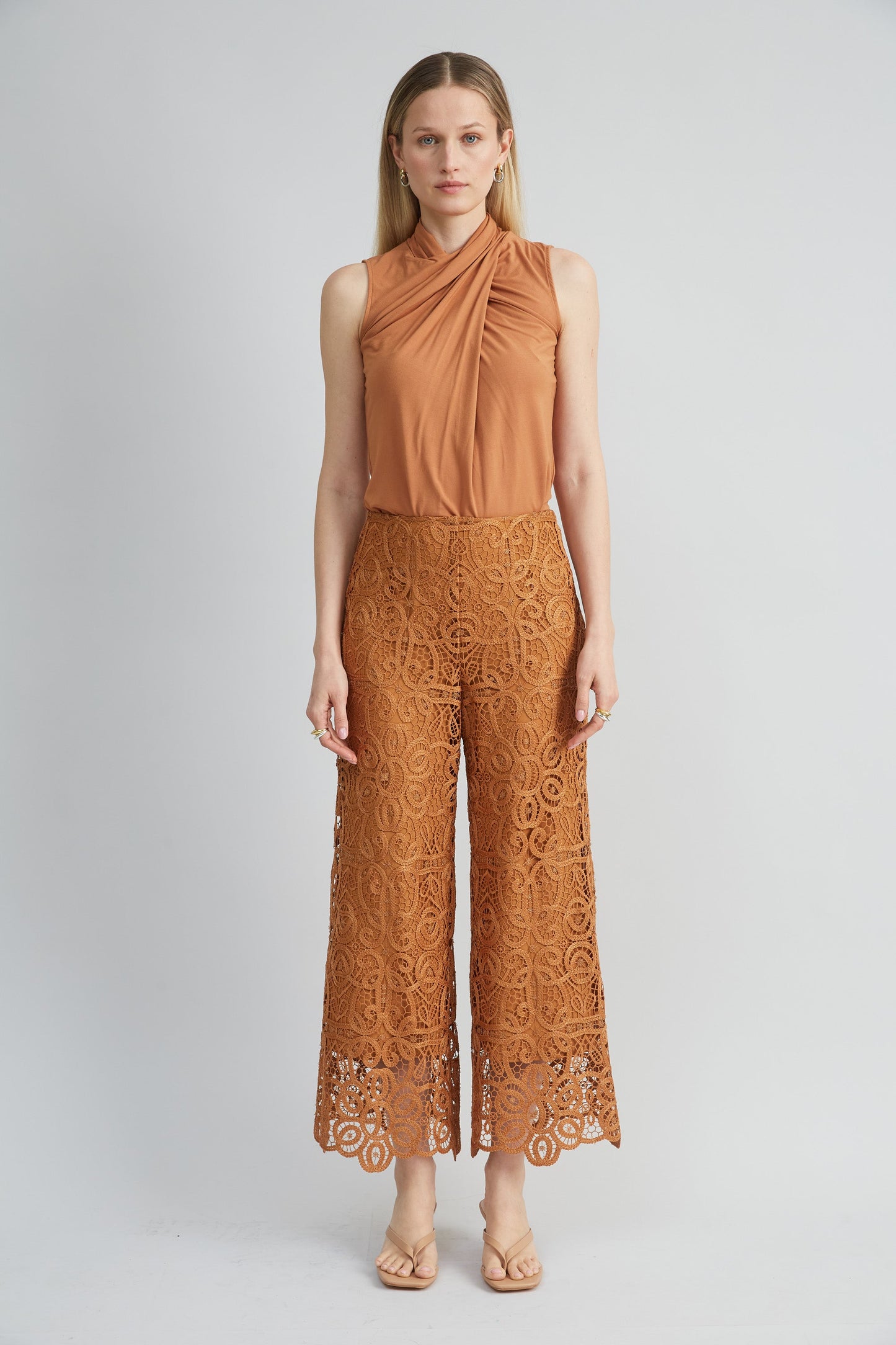Sleeveless Twist Neck Knit