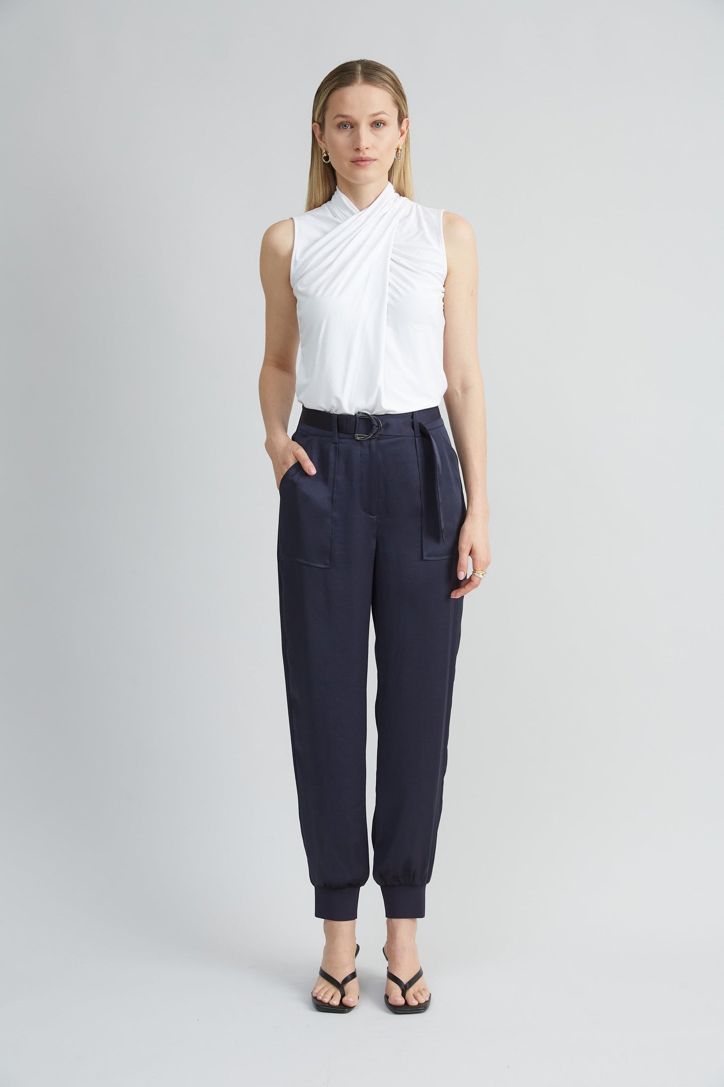 Sleeveless Twist Neck Knit