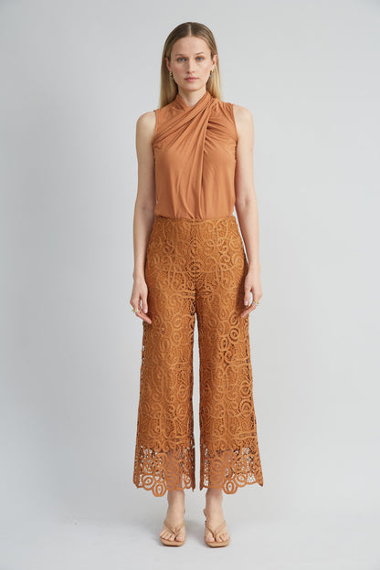 Sleeveless Twist Neck Knit