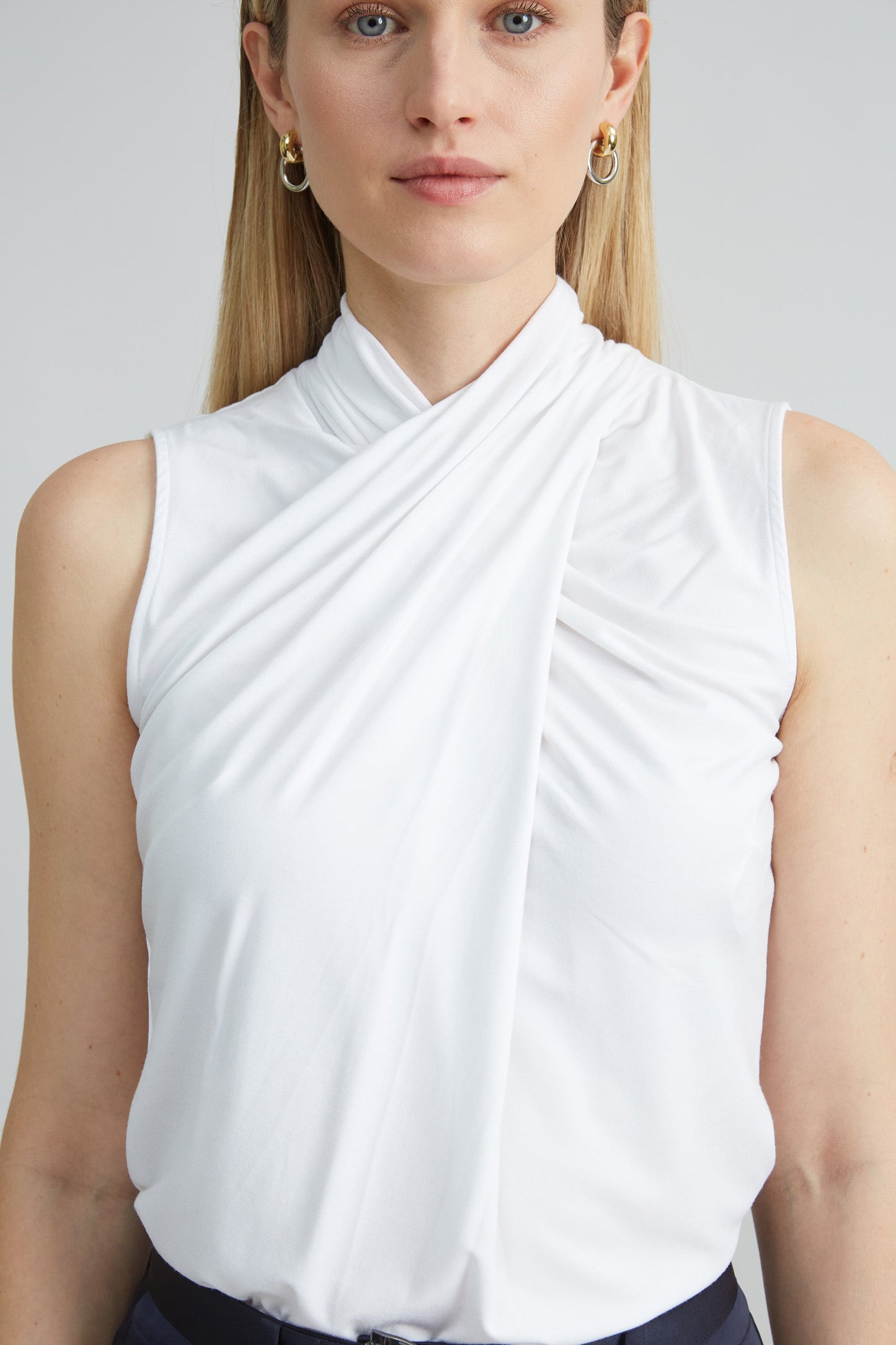 Sleeveless Twist Neck Knit