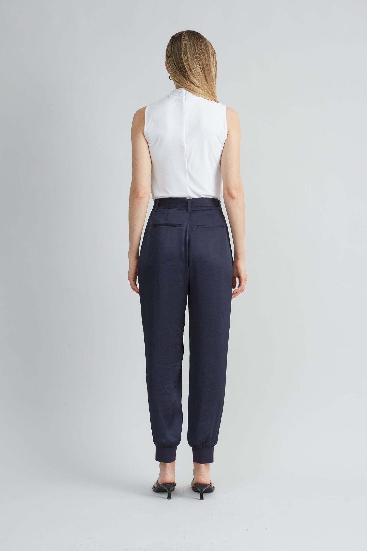 Sleeveless Twist Neck Knit